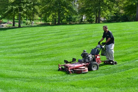 Lawn mowing trailers